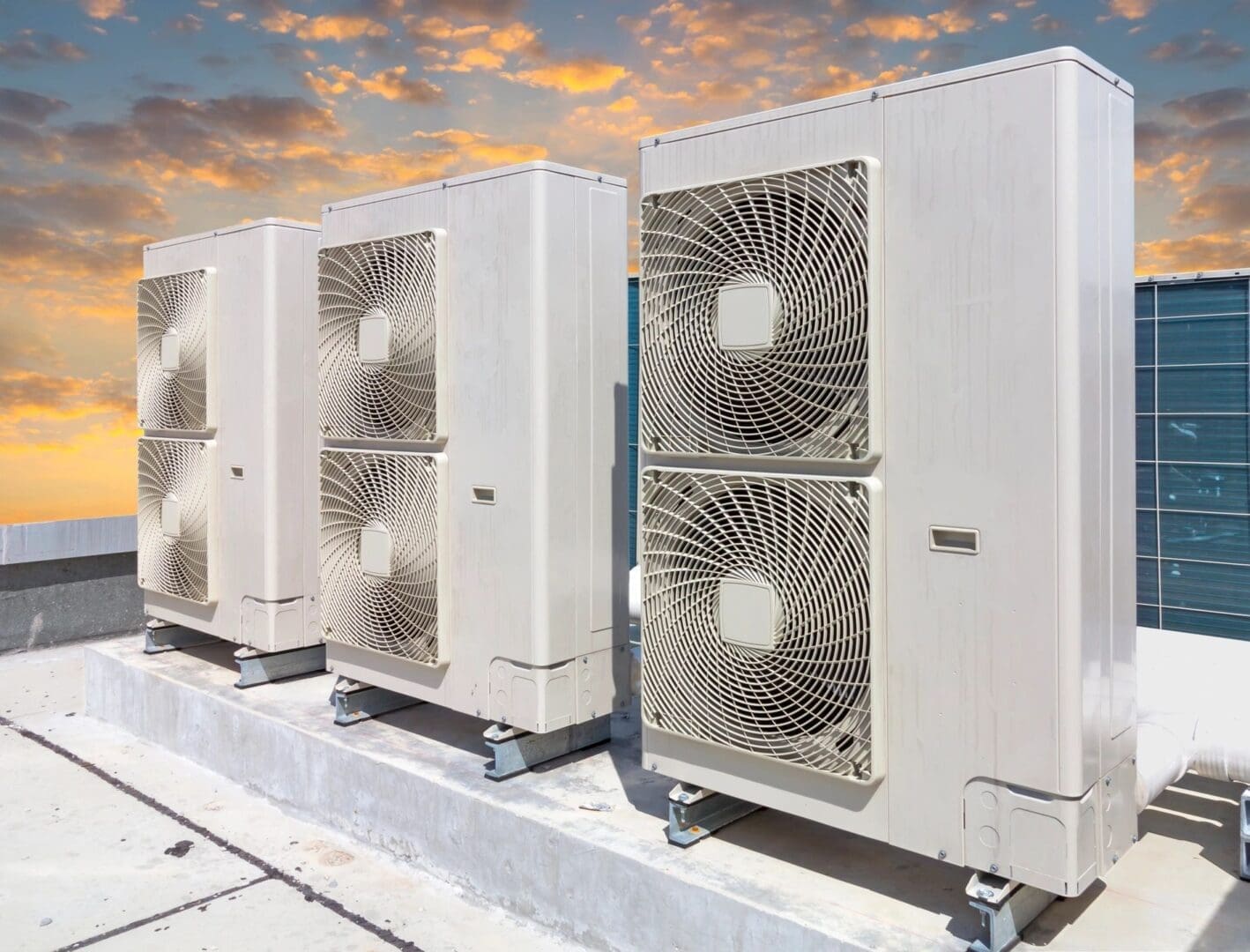 Ductless AC Systems Ductless ac systems installed on a rooftop with secured brackets