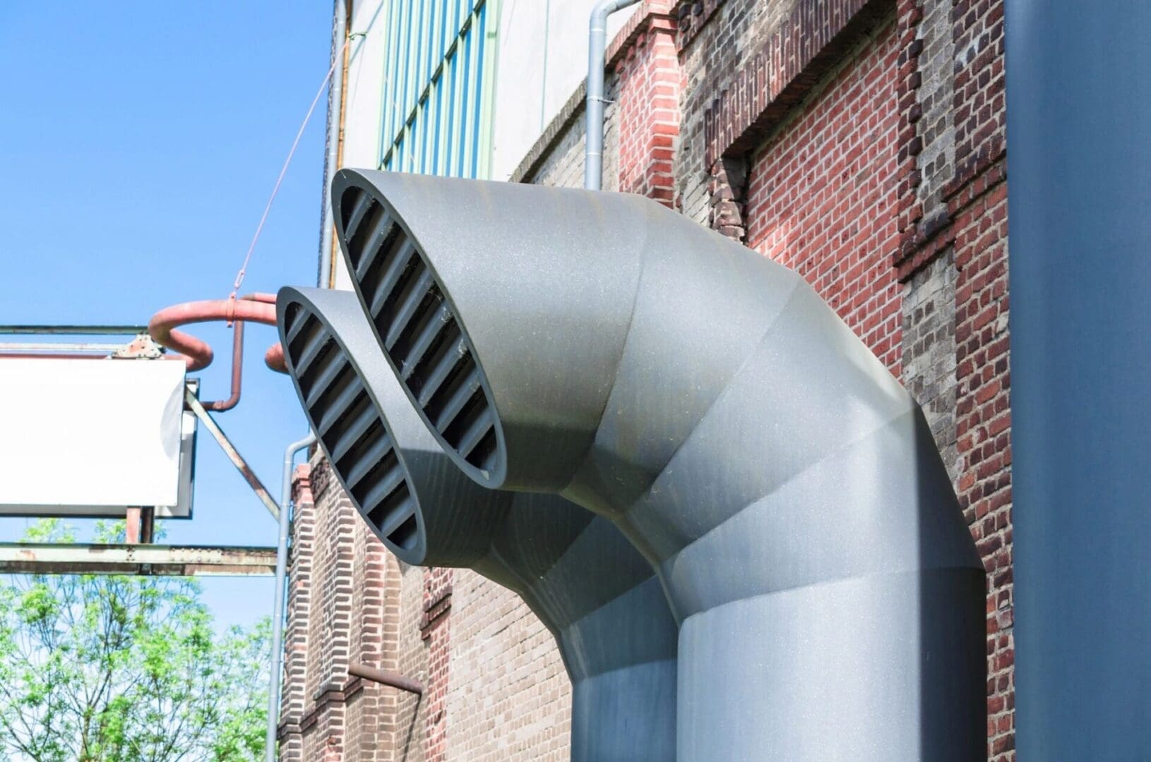 Exhaust Vents Large exhaust vents facing away from a commercial building