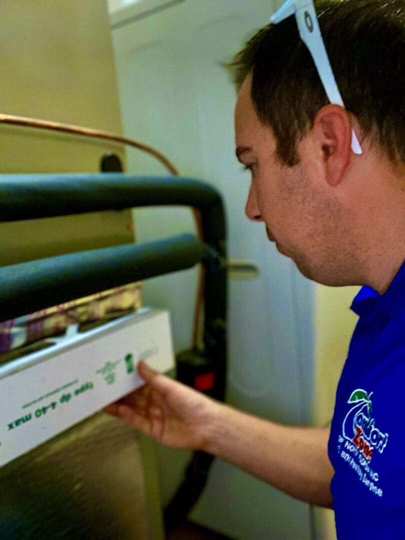 AC maintenance AC Filter check up during a residential maintenance