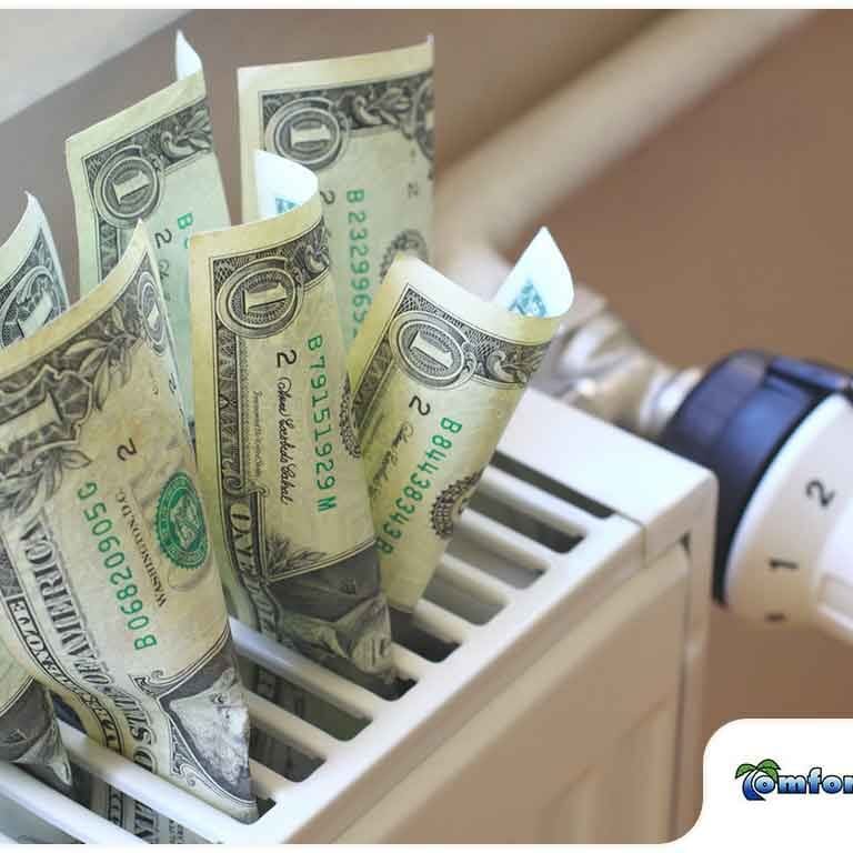 A depiction of money being burned by an inefficient heating radiator, symbolizing the high energy costs of outdated or poorly maintained systems