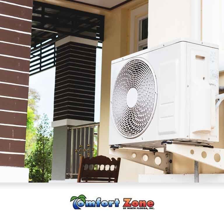 A white zoned air conditioner mounted on the side of a building.